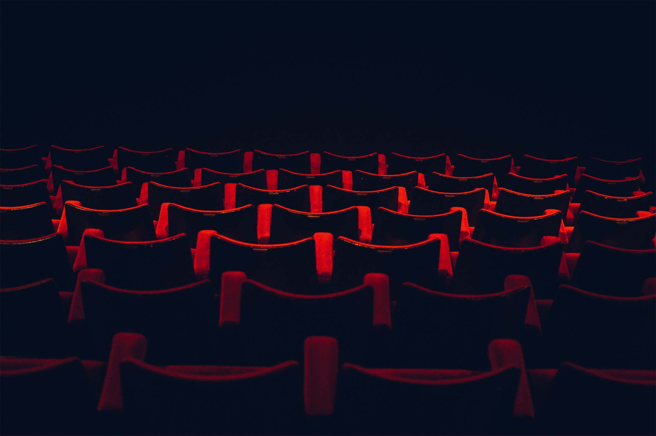 Red velvet seat in vintage theatre